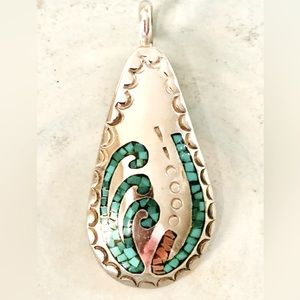 Turquoise and Coral Inlayed Pendant. Sterling silver. 1.5” long and 1” wide